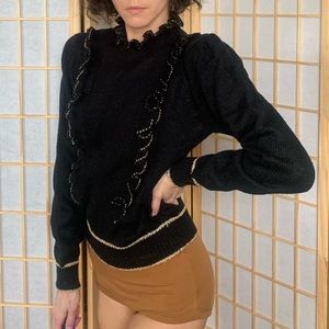 SKIVA black and gold ruffle sweater with high collar and 2 gold buttons on back
